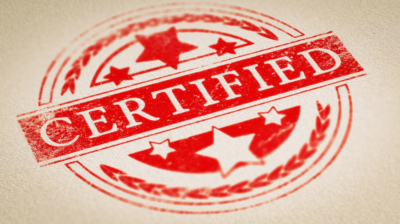 Red ‘Certified’ stamp indicating approval or verification status, signaling that a document, vendor, or process has met required standards.